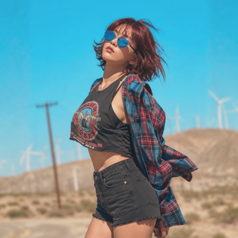Giorni Fantasista: Sounds from Harbour Bay, Volume III — woman in mirrored sunglasses before desert wind turbines